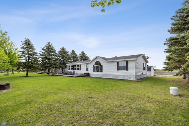 3022 Sandy Beach Rd, Hatton, ND 58240 - view of front of home with a front lawn and a patio