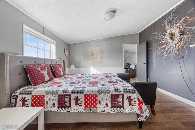 3022 Sandy Beach Rd, Hatton, ND 58240 - bedroom with ornamental molding, a textured ceiling, and wood finished floors