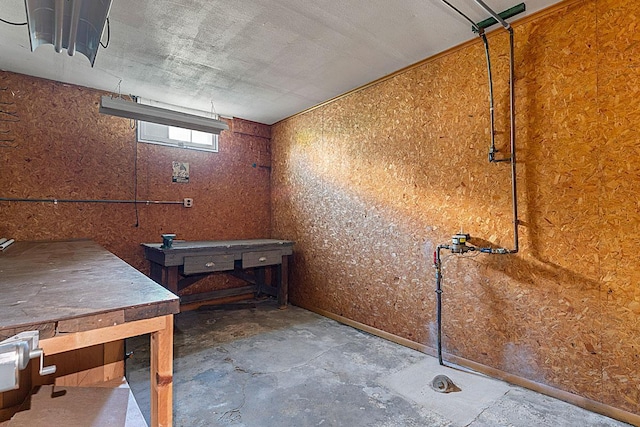 408 5th St E, Northfield, MN 55057 - misc room with concrete flooring and a workshop area