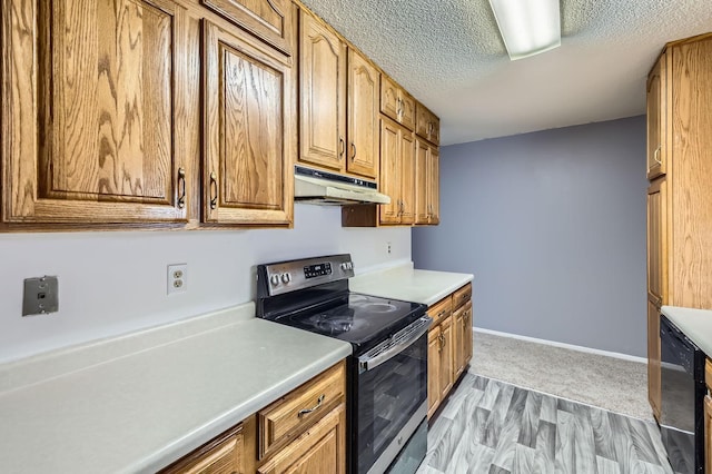 3944 76th Way E, Inver Grove Heights, MN 55076 - kitchen featuring stainless steel electric range, under cabinet range hood, light countertops, black dishwasher, and brown cabinetry