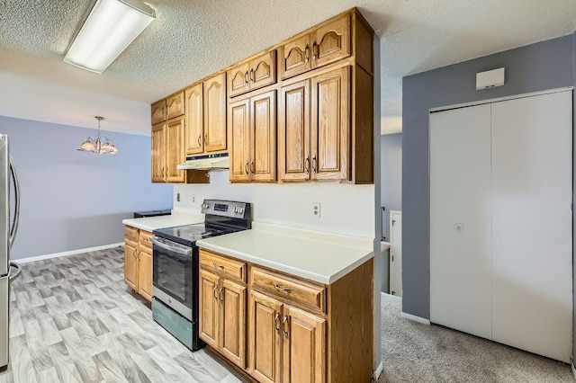 3944 76th Way E, Inver Grove Heights, MN 55076 - kitchen featuring stainless steel appliances, under cabinet range hood, light countertops, a textured ceiling, and a chandelier