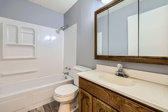 3944 76th Way E, Inver Grove Heights, MN 55076 - full bathroom with toilet, vanity, and bathtub / shower combination