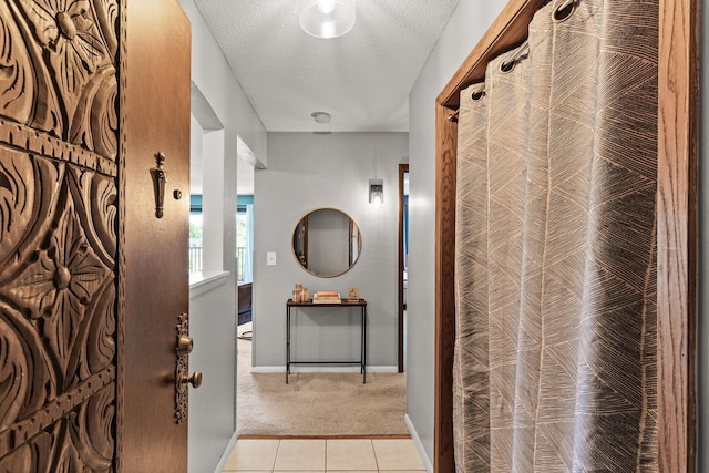 2200 Nevada Ave S Unit 320, Saint Louis Park, MN 55426 - hall with light carpet, light tile patterned floors, a heating unit, and a textured ceiling