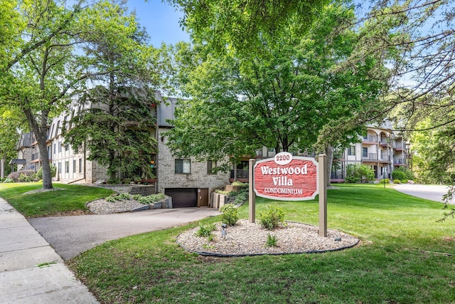 2200 Nevada Ave S Unit 320, Saint Louis Park, MN 55426 - community / neighborhood sign with an attached garage, driveway, and a yard