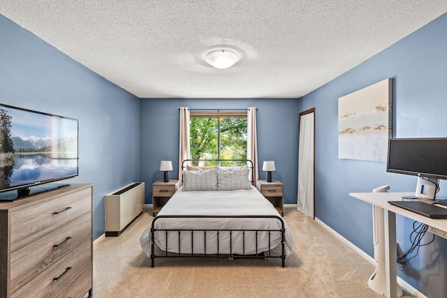 2200 Nevada Ave S Unit 320, Saint Louis Park, MN 55426 - bedroom featuring light carpet and a textured ceiling