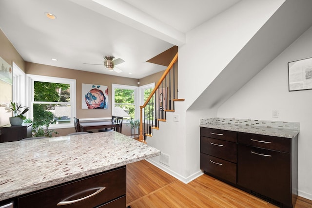 2934 Natchez Ave S, Saint Louis Park, MN 55416 - kitchen featuring light wood-style floors, baseboards, a ceiling fan, dark brown cabinets, and recessed lighting