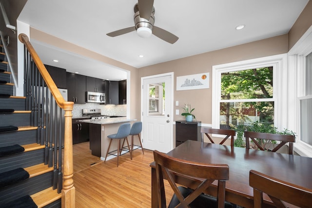 2934 Natchez Ave S, Saint Louis Park, MN 55416 - dining space with stairs, a ceiling fan, light wood-style floors, and recessed lighting