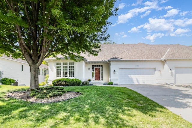 16630 Irwindale Way, Lakeville, MN 55044 - single story home featuring an attached garage, concrete driveway, stucco siding, and a front lawn