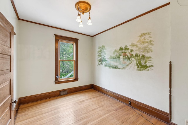216 Summit Ave, Center City, MN 55012 - empty room with light wood-style flooring, crown molding, and baseboards