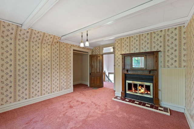 216 Summit Ave, Center City, MN 55012 - unfurnished living room with beamed ceiling, wallpapered walls, carpet, and a glass covered fireplace