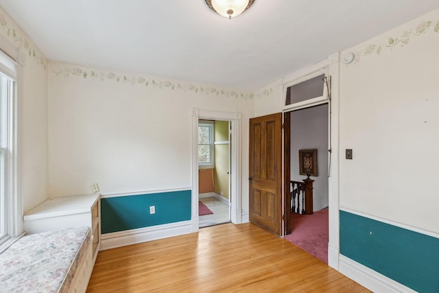 216 Summit Ave, Center City, MN 55012 - unfurnished bedroom with light wood-style floors and baseboards