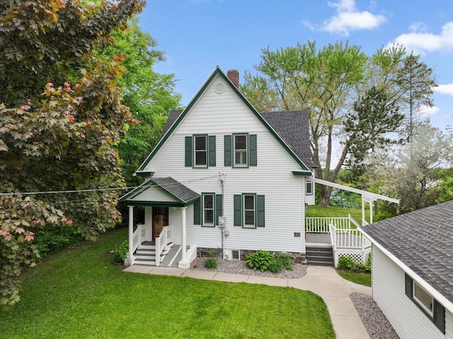 216 Summit Ave, Center City, MN 55012 - back of house featuring a yard, a chimney, a shingled roof, and a deck
