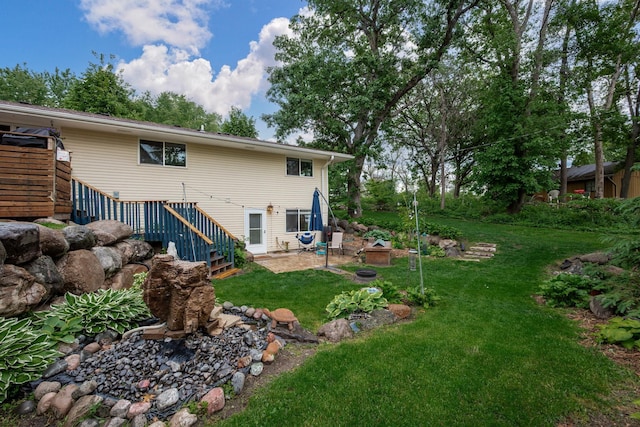 1751 Resthaven Ln, Mound, MN 55364 - back of property featuring stairs, a lawn, and a patio