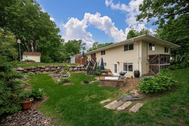1751 Resthaven Ln, Mound, MN 55364 - rear view of property featuring stairway, a yard, and a sunroom