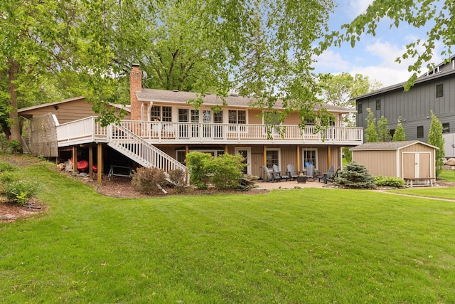 1709 Baywood Ln, Mound, MN 55364 - back of house with a wooden deck, a yard, a chimney, stairs, and a patio area
