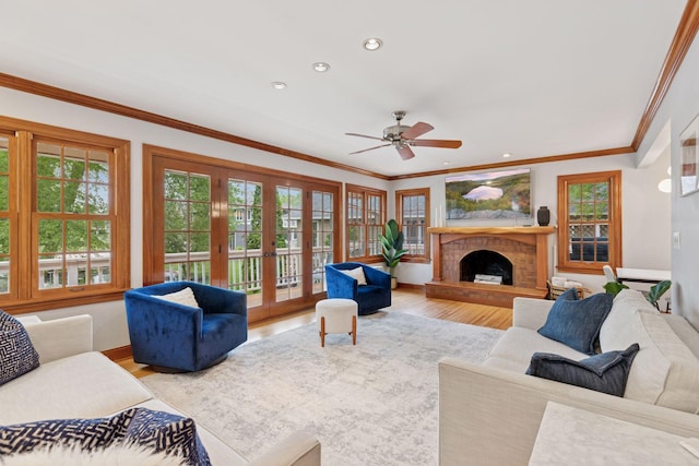 1709 Baywood Ln, Mound, MN 55364 - living room featuring french doors, wood finished floors, recessed lighting, ceiling fan, and a fireplace with raised hearth