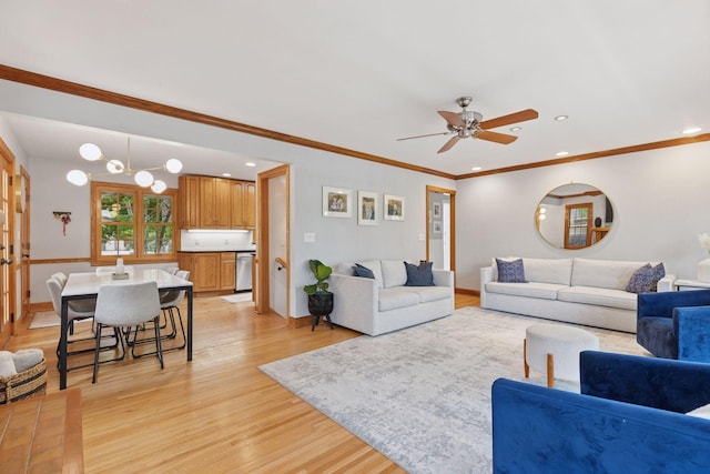 1709 Baywood Ln, Mound, MN 55364 - living area featuring light wood-style flooring, a ceiling fan, recessed lighting, ornamental molding, and baseboards