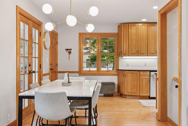 1709 Baywood Ln, Mound, MN 55364 - dining room featuring light wood finished floors, a chandelier, and french doors