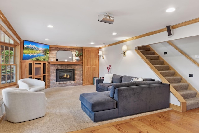 1709 Baywood Ln, Mound, MN 55364 - living room featuring stairs, a brick fireplace, recessed lighting, ornamental molding, and wood finished floors