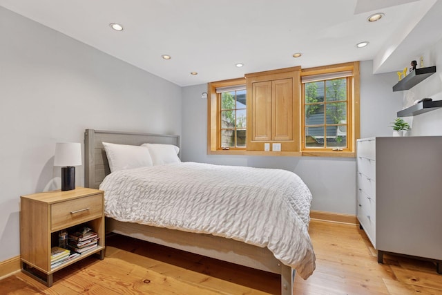 1709 Baywood Ln, Mound, MN 55364 - bedroom with baseboards, recessed lighting, and light wood-style floors