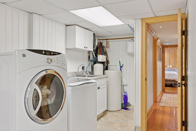 1709 Baywood Ln, Mound, MN 55364 - washroom with cabinet space and washing machine and clothes dryer