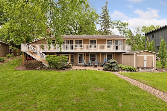 1709 Baywood Ln, Mound, MN 55364 - rear view of property with a wooden deck, a lawn, a chimney, and a patio area