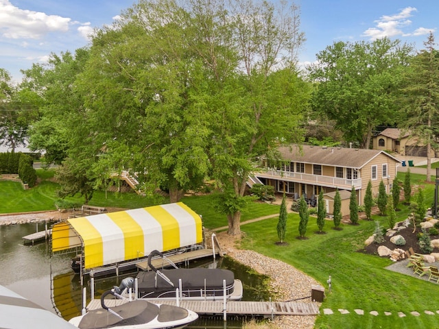 1709 Baywood Ln, Mound, MN 55364 - dock area with boat lift, a water view, and a yard