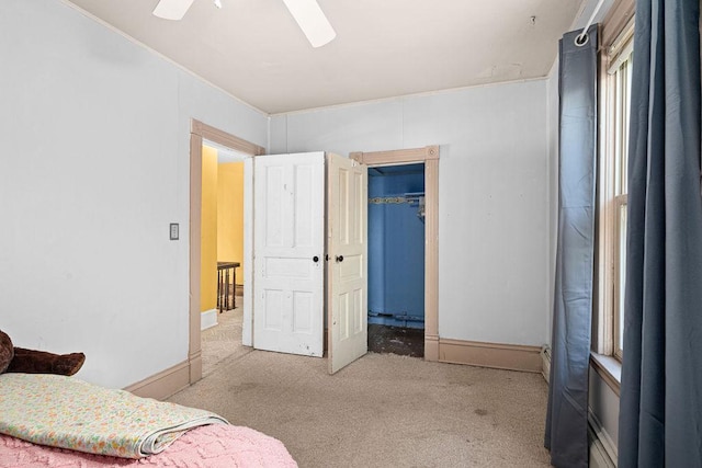 2718 3rd St, Duluth, MN 55806 - carpeted bedroom with ceiling fan and baseboards