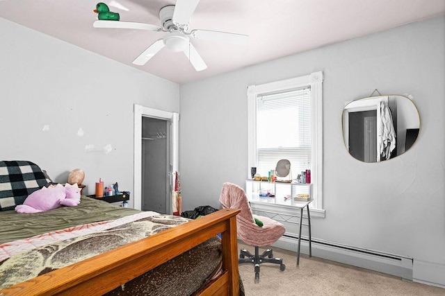 2718 3rd St, Duluth, MN 55806 - bedroom with a baseboard heating unit, light colored carpet, and ceiling fan