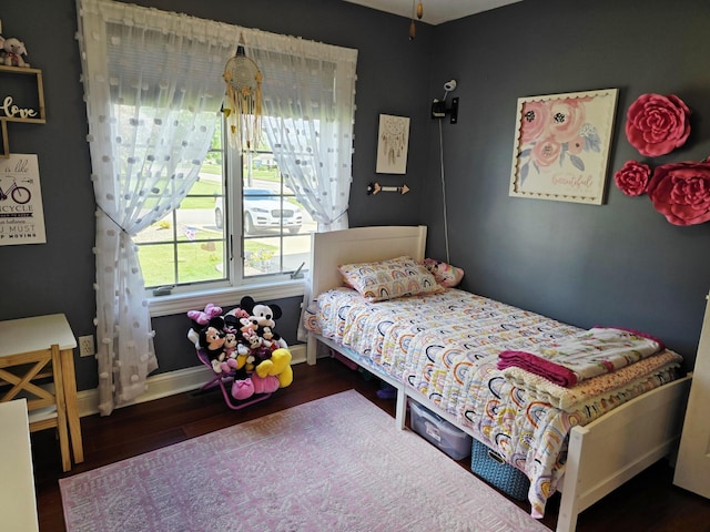 1612 17th St SW, Austin, MN 55912 - bedroom with wood finished floors and baseboards