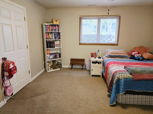 1612 17th St SW, Austin, MN 55912 - bedroom with carpet and baseboards