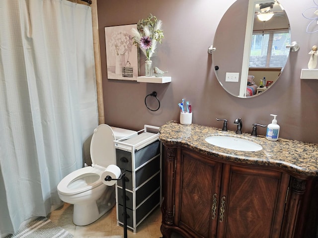 1612 17th St SW, Austin, MN 55912 - bathroom featuring toilet, tile patterned floors, vanity, and a shower with shower curtain
