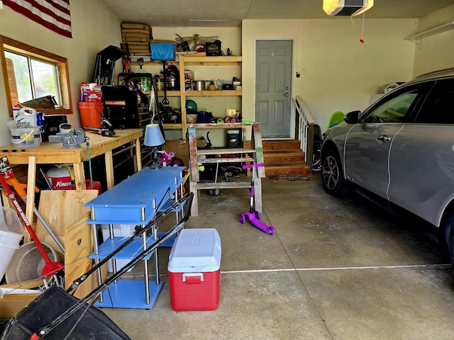 1612 17th St SW, Austin, MN 55912 - garage featuring a workshop area and a garage door opener