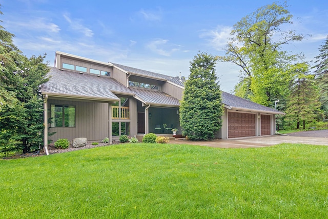 1515 18th Ave, Pleasant Valley Twp, WI 54022 - mid-century home with concrete driveway, a front yard, and a garage