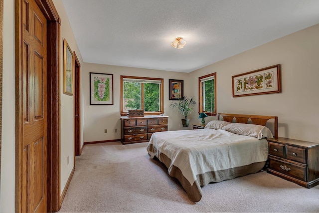2904 Park Dr, Saint Cloud, MN 56303 - bedroom featuring light colored carpet and a textured ceiling