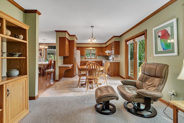 2904 Park Dr, Saint Cloud, MN 56303 - dining area with a chandelier, crown molding, and light colored carpet