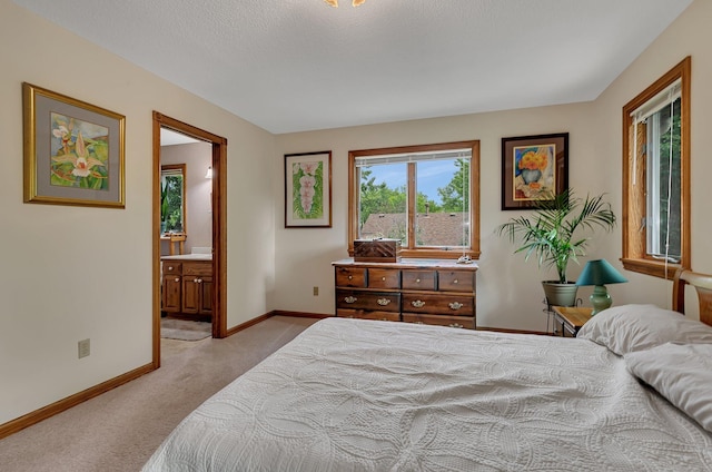 2904 Park Dr, Saint Cloud, MN 56303 - bedroom with light colored carpet and ensuite bath