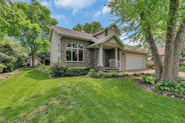 2904 Park Dr, Saint Cloud, MN 56303 - view of front of property featuring a garage, a front yard, concrete driveway, and brick siding
