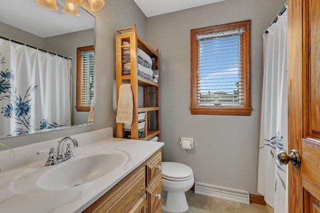2904 Park Dr, Saint Cloud, MN 56303 - full bath with vanity, baseboard heating, and tile patterned floors
