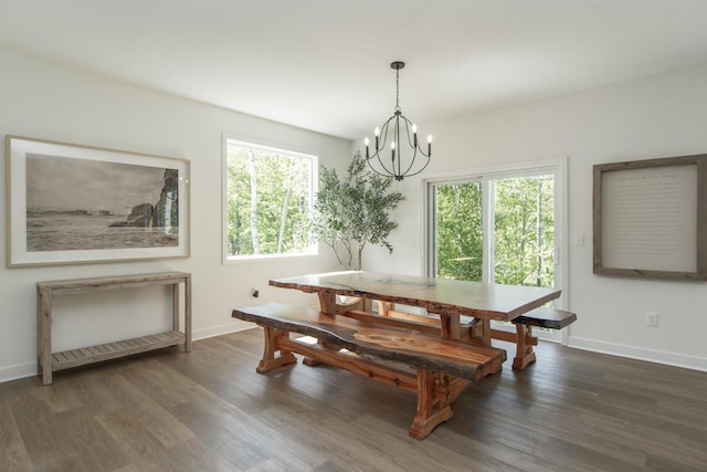 31709 Green Scene Dr, Breezy Point, MN 56472 - dining space with a chandelier, wood finished floors, and baseboards