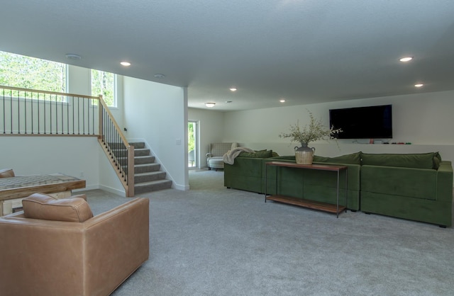 31709 Green Scene Dr, Breezy Point, MN 56472 - carpeted living area with recessed lighting, stairway, and baseboards
