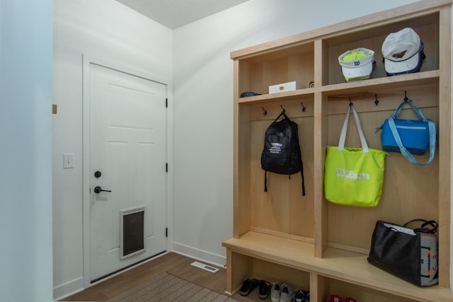 31709 Green Scene Dr, Breezy Point, MN 56472 - mudroom with wood finished floors and baseboards