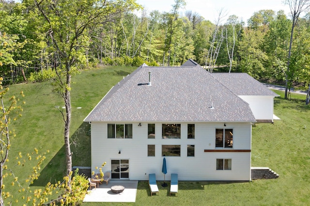 31709 Green Scene Dr, Breezy Point, MN 56472 - back of property with a patio area, a yard, and a shingled roof