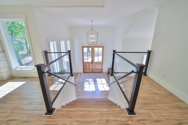 20482 Lord Rd, Center Twp, MN 56465 - entryway with plenty of natural light, a chandelier, and light wood-style flooring
