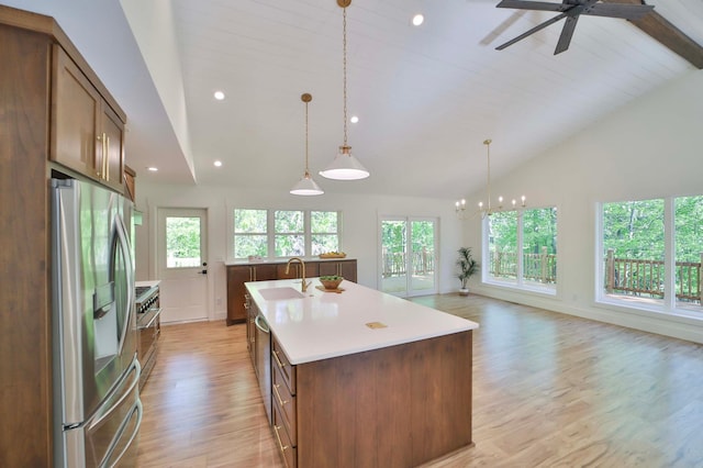 20482 Lord Rd, Center Twp, MN 56465 - kitchen featuring stainless steel appliances, healthy amount of natural light, a kitchen island with sink, light wood finished floors, and recessed lighting