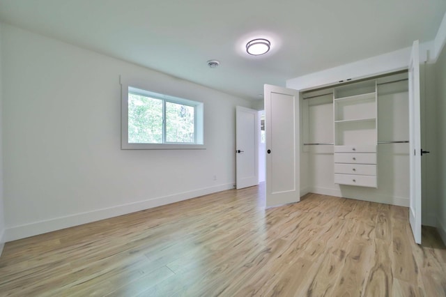 20482 Lord Rd, Center Twp, MN 56465 - unfurnished bedroom with light wood-style floors and a closet