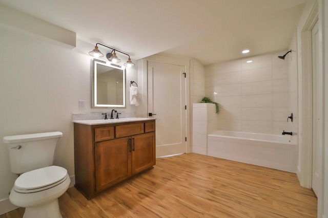 20482 Lord Rd, Center Twp, MN 56465 - full bath with vanity, wood finished floors, tub / shower combination, and recessed lighting