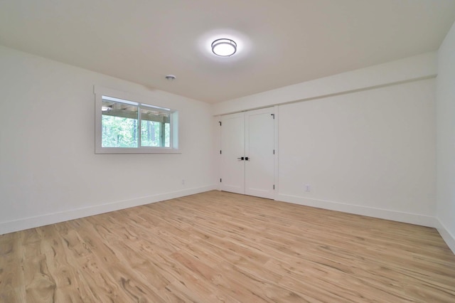 20482 Lord Rd, Center Twp, MN 56465 - unfurnished bedroom featuring light wood finished floors and baseboards