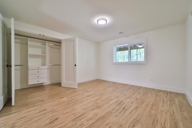 20482 Lord Rd, Center Twp, MN 56465 - unfurnished bedroom featuring light wood-type flooring and a closet