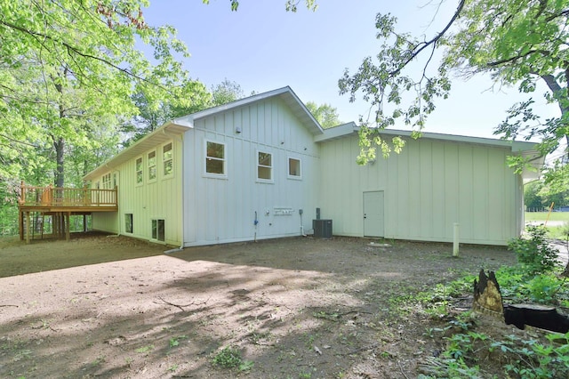 20482 Lord Rd, Center Twp, MN 56465 - rear view of house featuring board and batten siding and a wooden deck